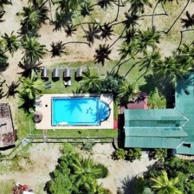 Helios Beach Resort logo